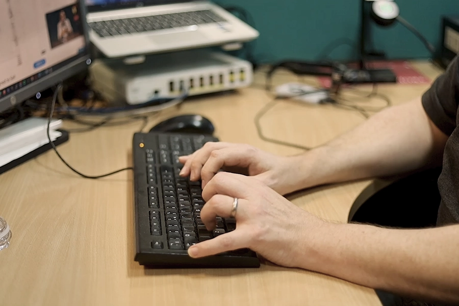 Close up shot of Jera IT team member working on the computer