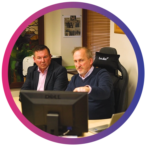 Two Jera IT team members working together in the office