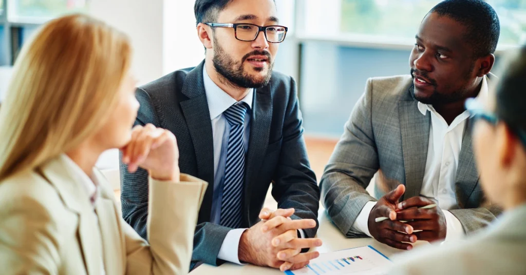 Group discussing over a meeting table